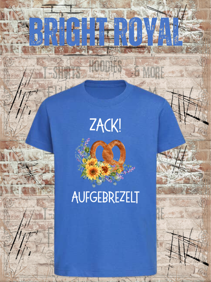 Kinder-T-Shirt „Zack! Aufgebrezelt“ in Bright Royal.