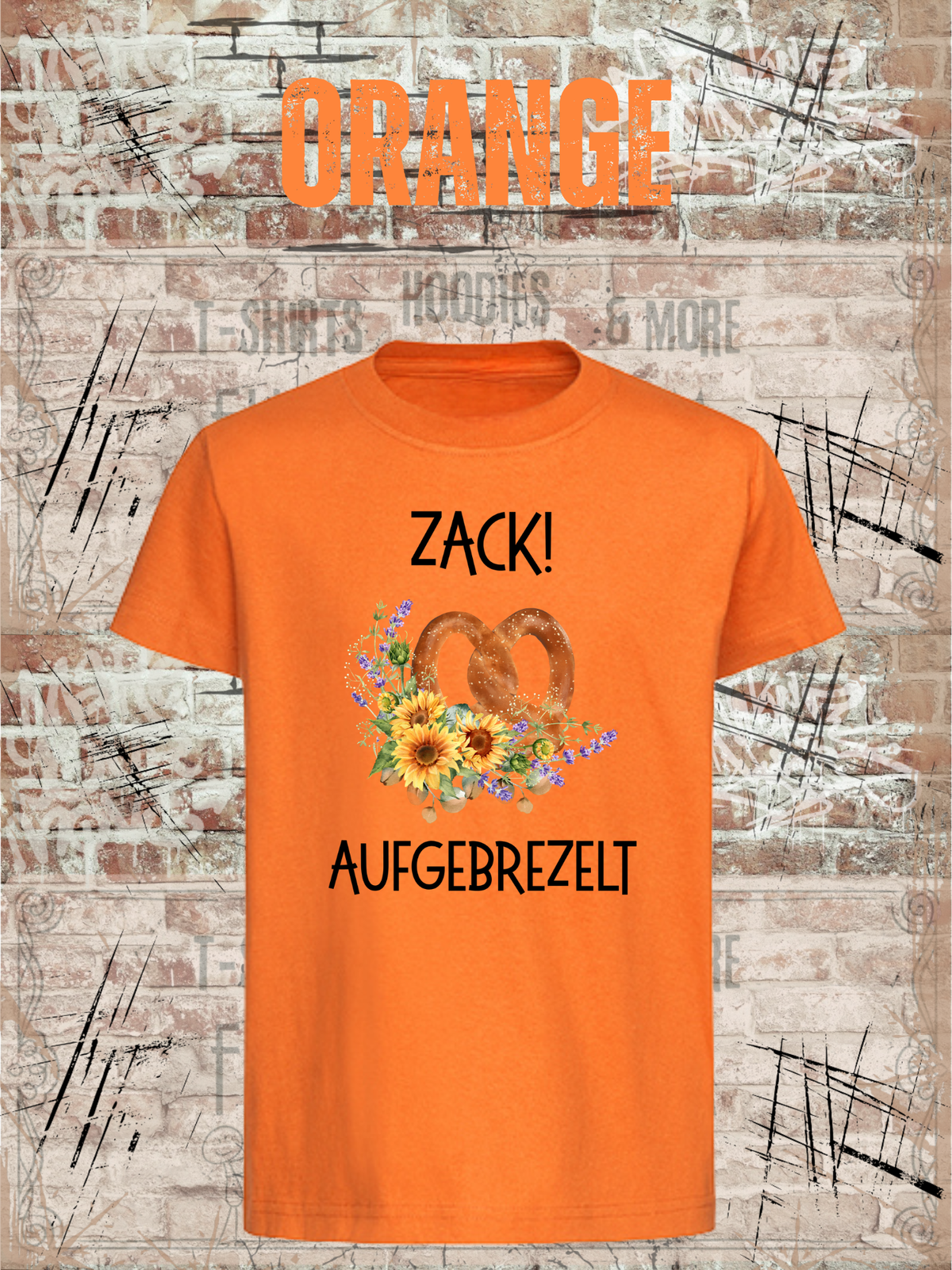 Kinder-T-Shirt „Zack! Aufgebrezelt“ in Orange.
