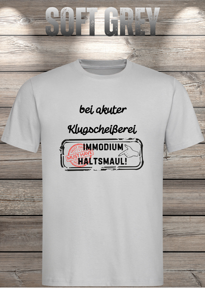 Unisex-T-Shirt „Bei akuter Klugscheisserei Immodium Halts Maul“ in Soft Grey.