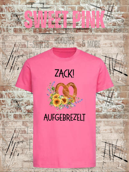 Kinder-T-Shirt „Zack! Aufgebrezelt“ in Sweet Pink.
