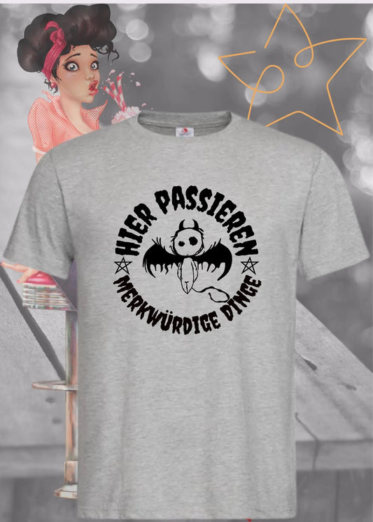 🔮 Unisex T-Shirt 'Hier Passieren Merkwürdige Dinge' - Mystisches Statement Shirt